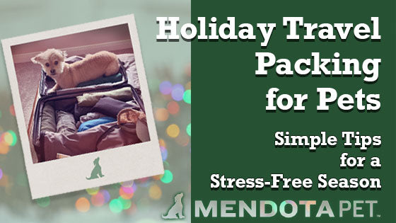 Dog sitting in a suitcase for the Mendota Pet blogpost “Holiday Travel Packing for Pets,” offering tips for stress-free holiday travel with pets.